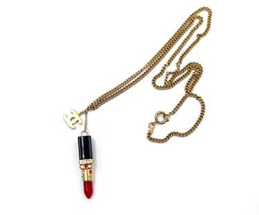 Chanel gold tone metal chain with lipstick charms in gift store box