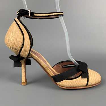 Alaia Natural & Black Straw Textured Bow Pumps