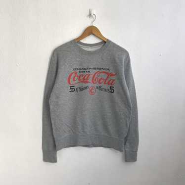 Coca Cola × Uniqlo Coca Cola Sweatshirt Big Spell… - image 1