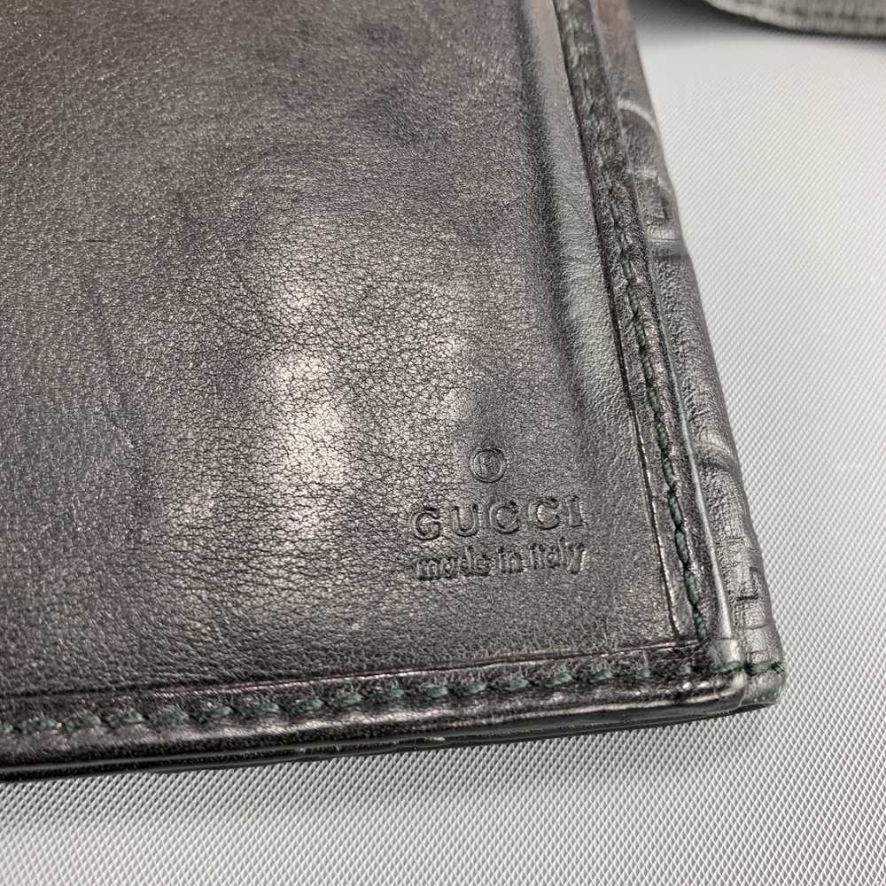 Gucci Monogram Embossed Leather Checkbook Wallet