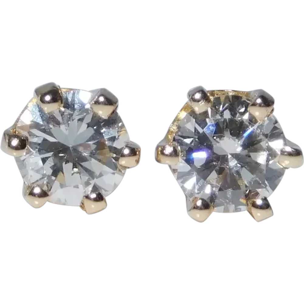 Glistening .56ctw Diamond Solitaire Stud Earrings… - image 1
