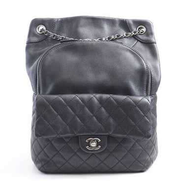 chanel black leather backpack used