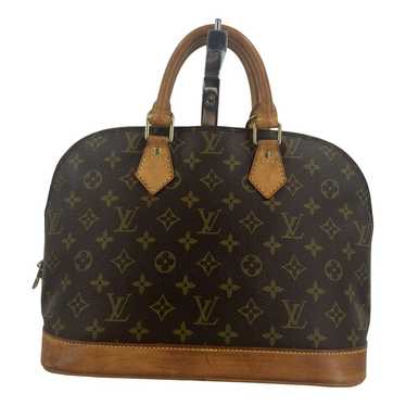 Louis Vuitton Alma cloth handbag