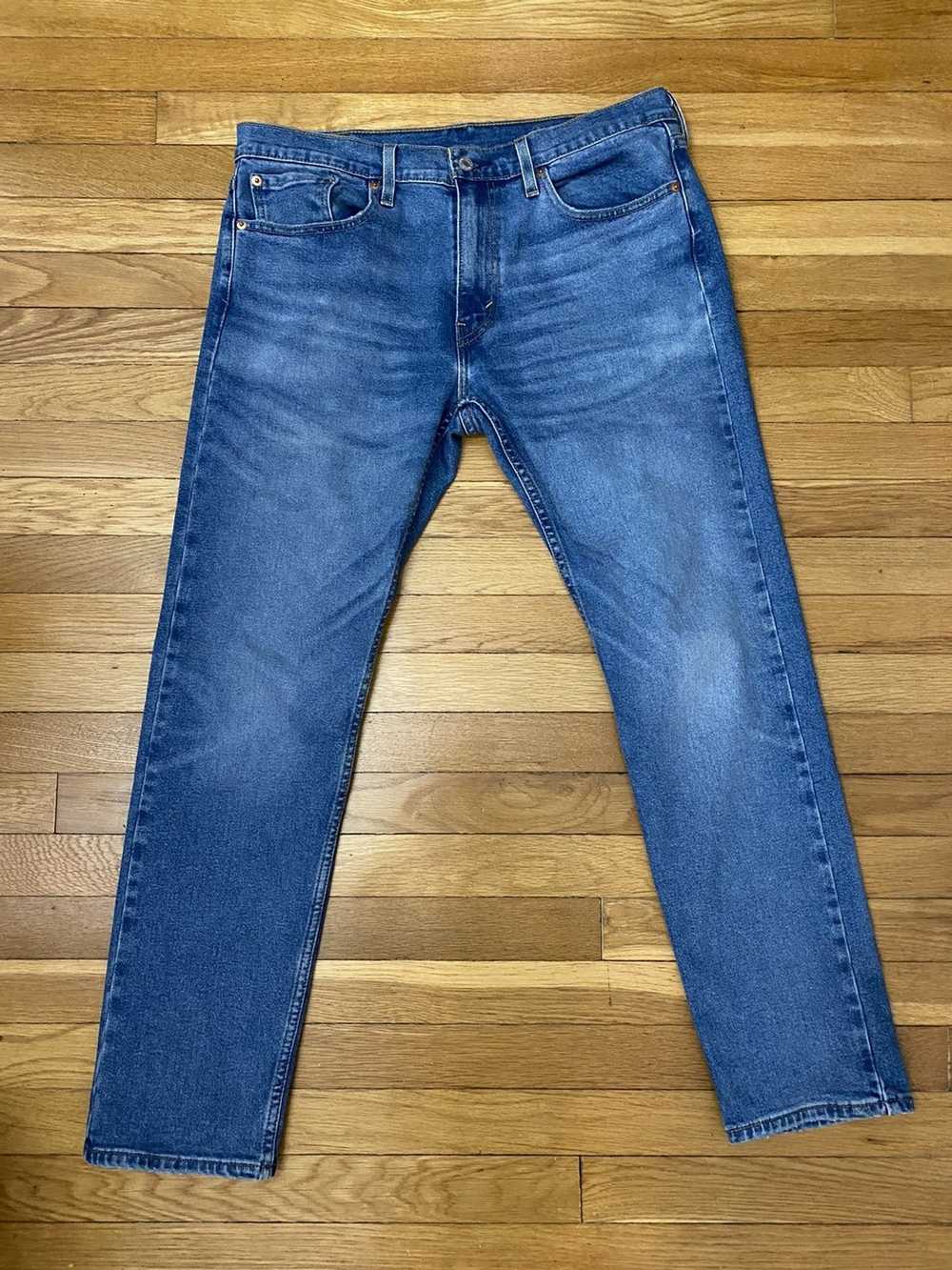 Levi's Levi’s 502 Medium Wash Denim Jeans Taper 3… - image 1