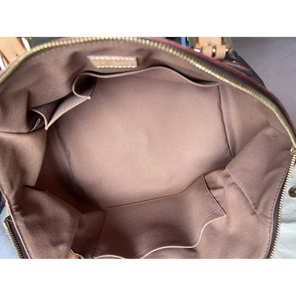 Louis Vuitton Tivoli leather handbag - image 12