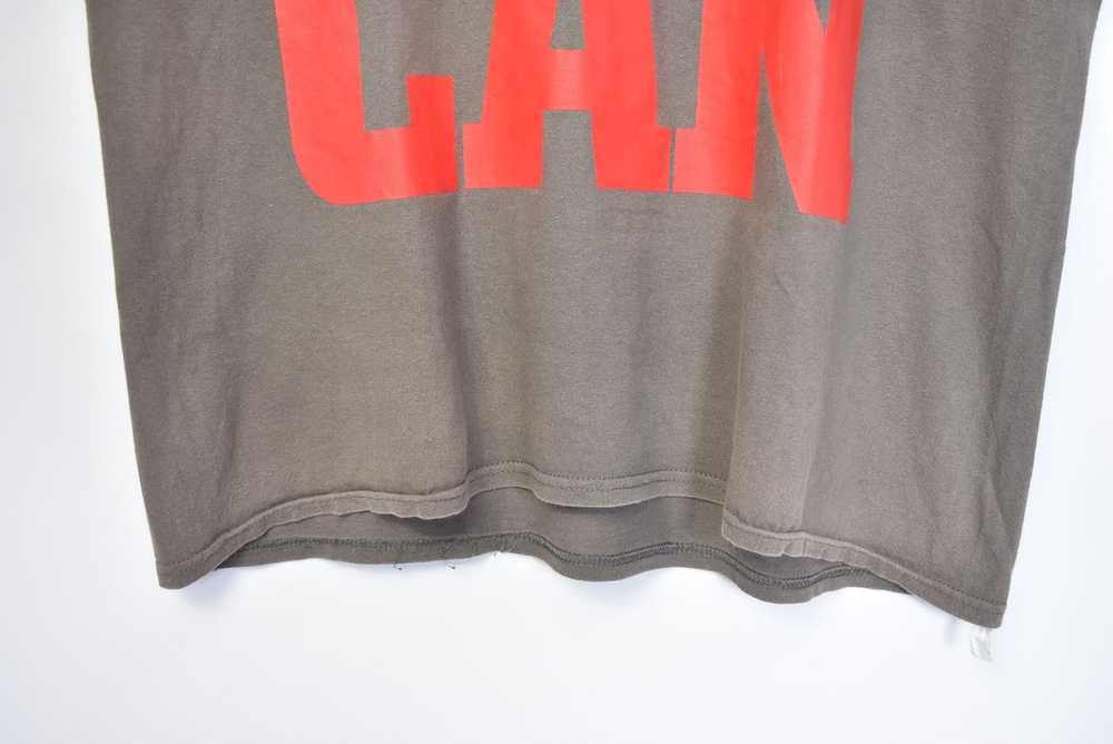 Undercover UNDERCOVER “I Want More Can” Graphic T… - image 5