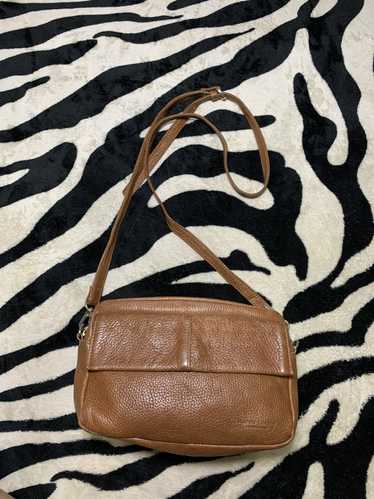 Brand Maari Askew sling bag leather