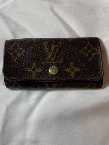 Louis Vuitton Authentic Mini Lin key holder brown tan - $240 (69% Off  Retail) - From Viktori