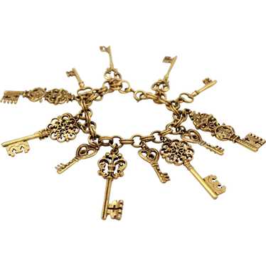 Vintage JULIANA Gold Ornate Skeleton Key Charm Da… - image 1