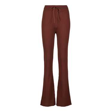 【送料&関税込】Nanushka Flared Trousers 22078197_52205353_600.jpg
