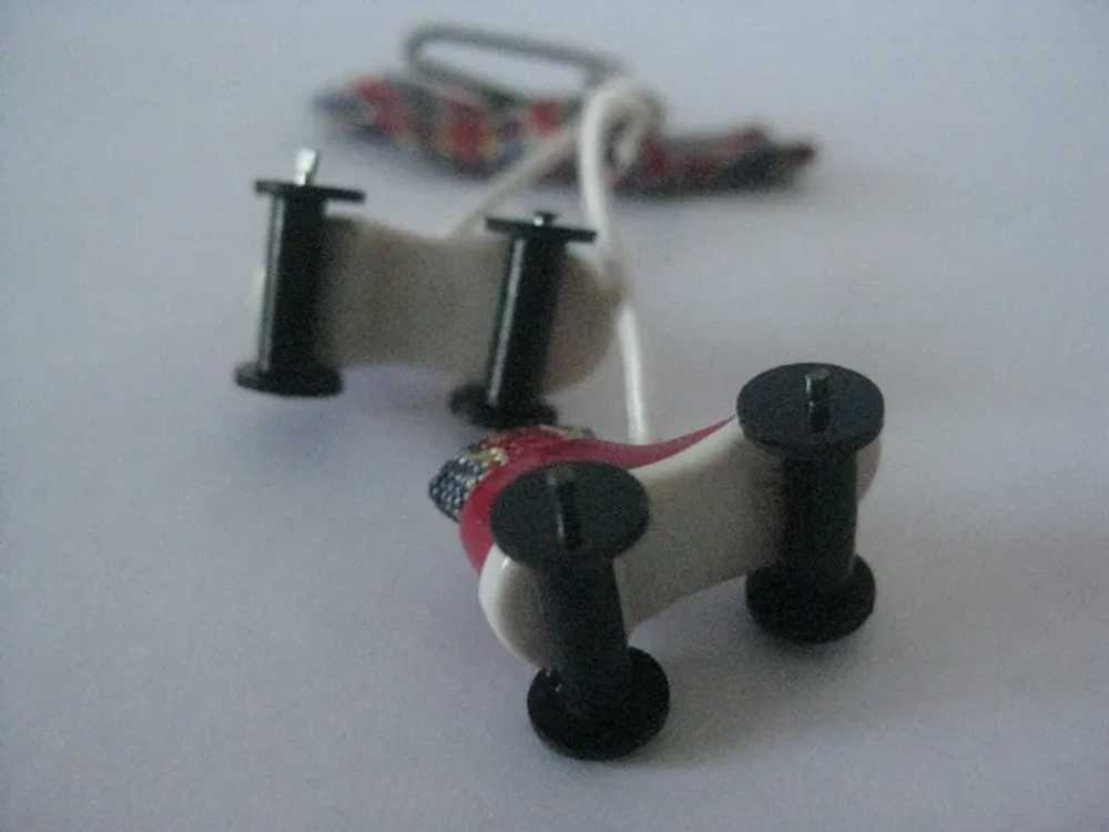 Roller-skate bow early plastic celluloid dangle p… - image 7