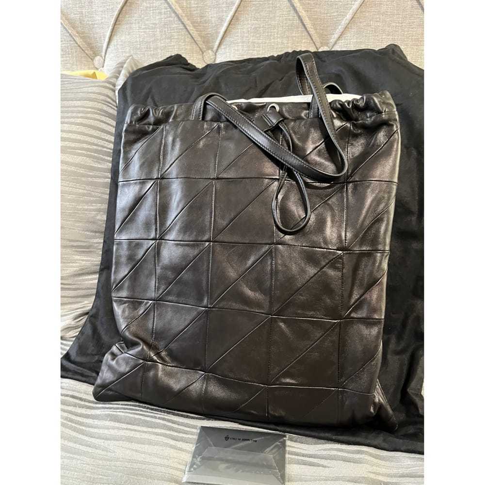 Saint Laurent Duffle leather handbag - image 12