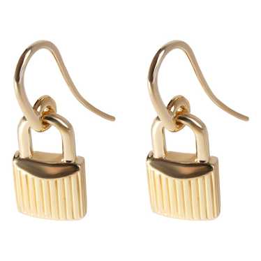 Tom Ford Yellow gold earrings