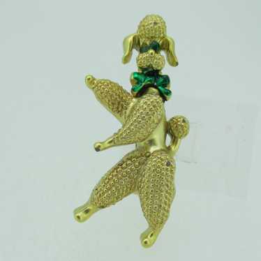 Vintage Gold Tone and Green Eyes Movable Dancing … - image 1