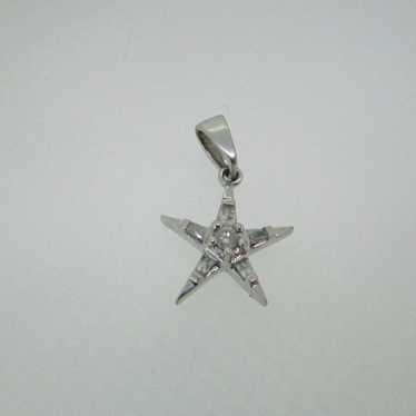 1/3 Ct. T.W. Composite Diamond Star Necklace Charm in 10K Gold