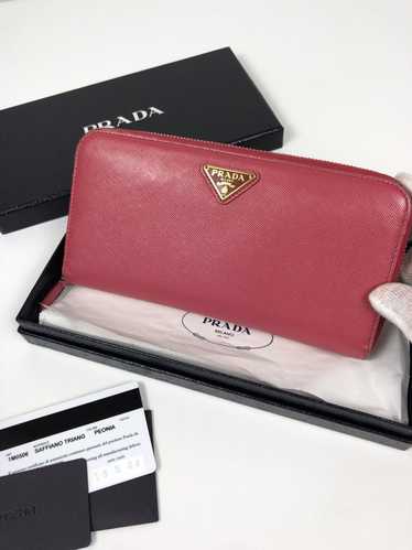 Prada Prada saffiano triang leather zippy wallet