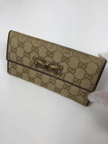 Gucci Gucci gg canvas monogram trifold wallet