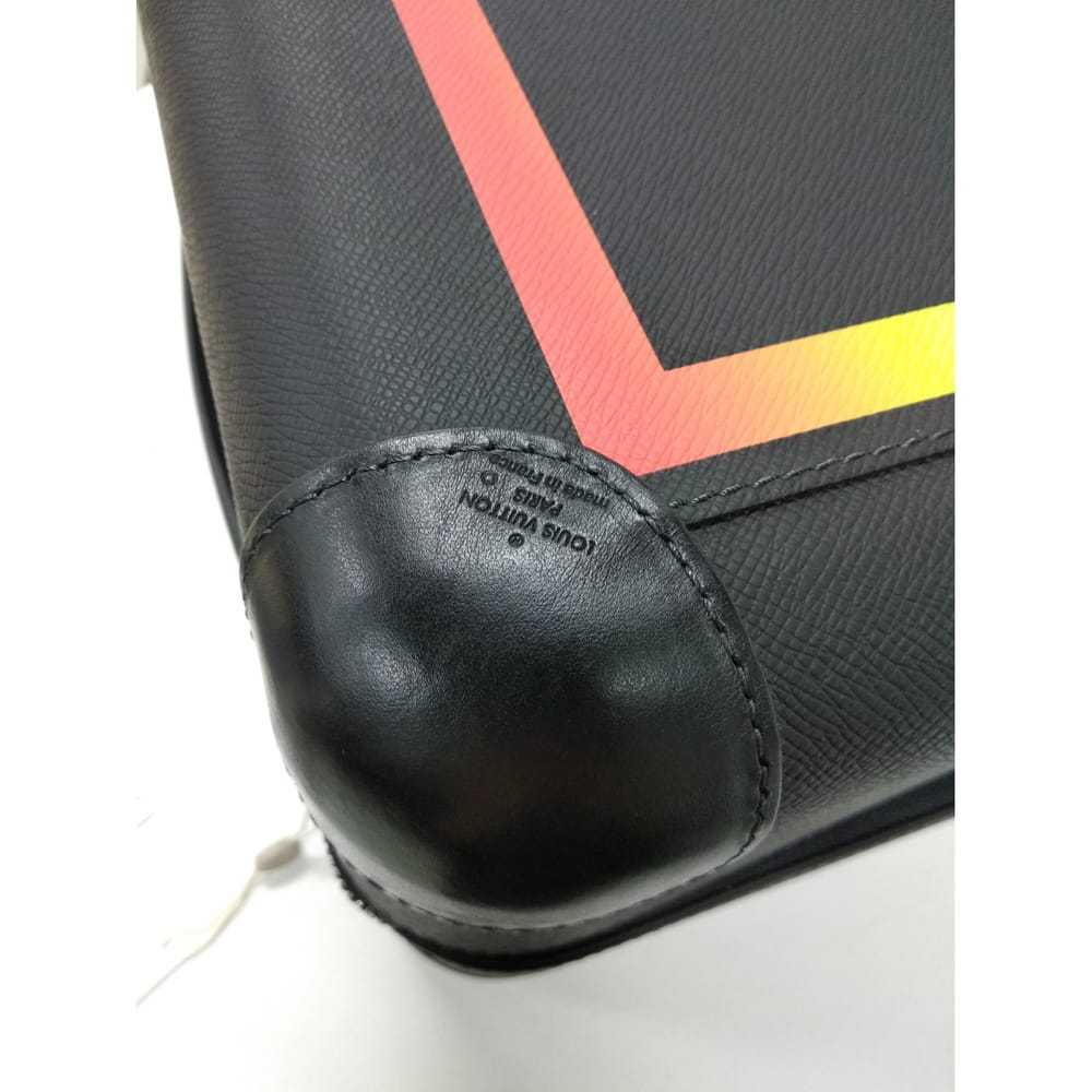 Louis Vuitton Horizon 55 leather travel bag - image 9