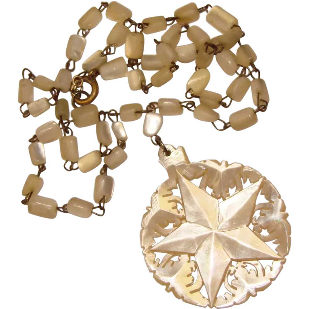 Gorgeous Carved Mother of Pearl Vintage Star Pend… - image 1