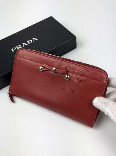 Prada Prada red bowtie leather zippy wallet