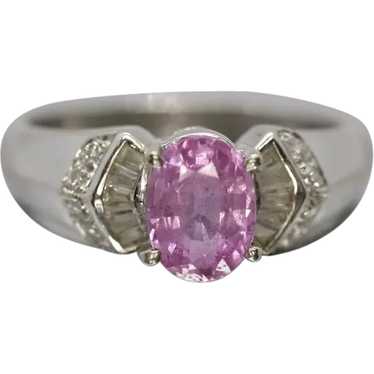 Oval Pink Sapphire Solitaire. 14k white gold with 