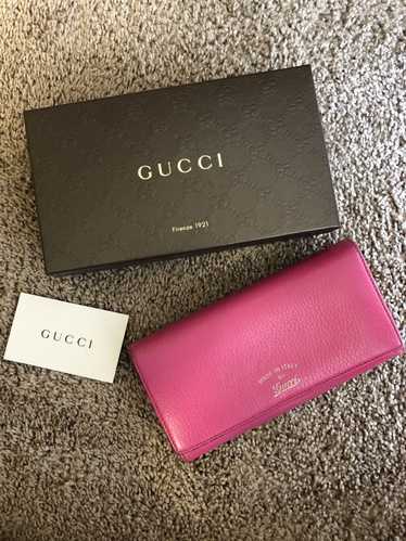 Gucci Gucci pink leather zippy long wallet