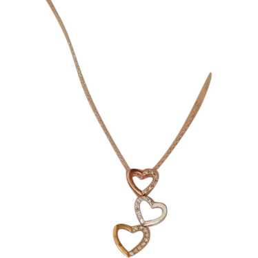 10K tricolor Triple Open Heart Diamond pendant. 10