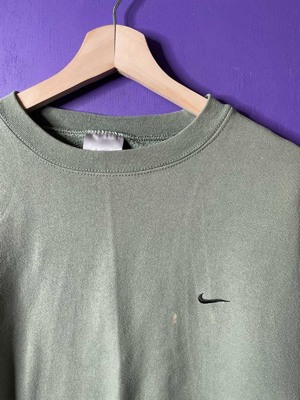 sage green nike shirt