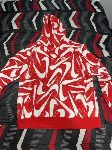 Red nike hoodie with white swoosh all over hot sale