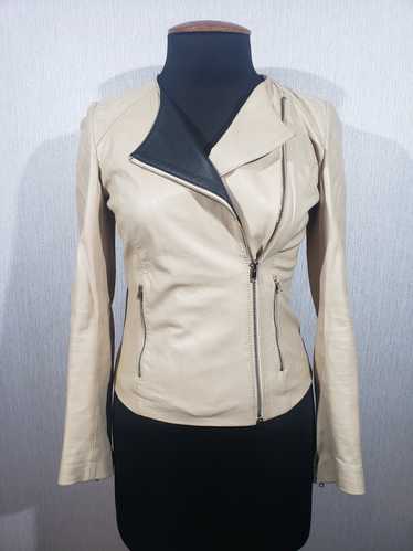 Designer × Uniqlo Stylish women's leather jacket.