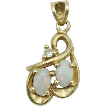 14K .02ctw Opal and Diamond Pendant