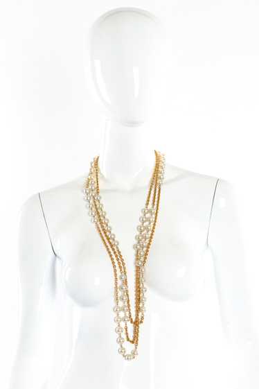 CHANEL Triple Strand Pearl Necklace