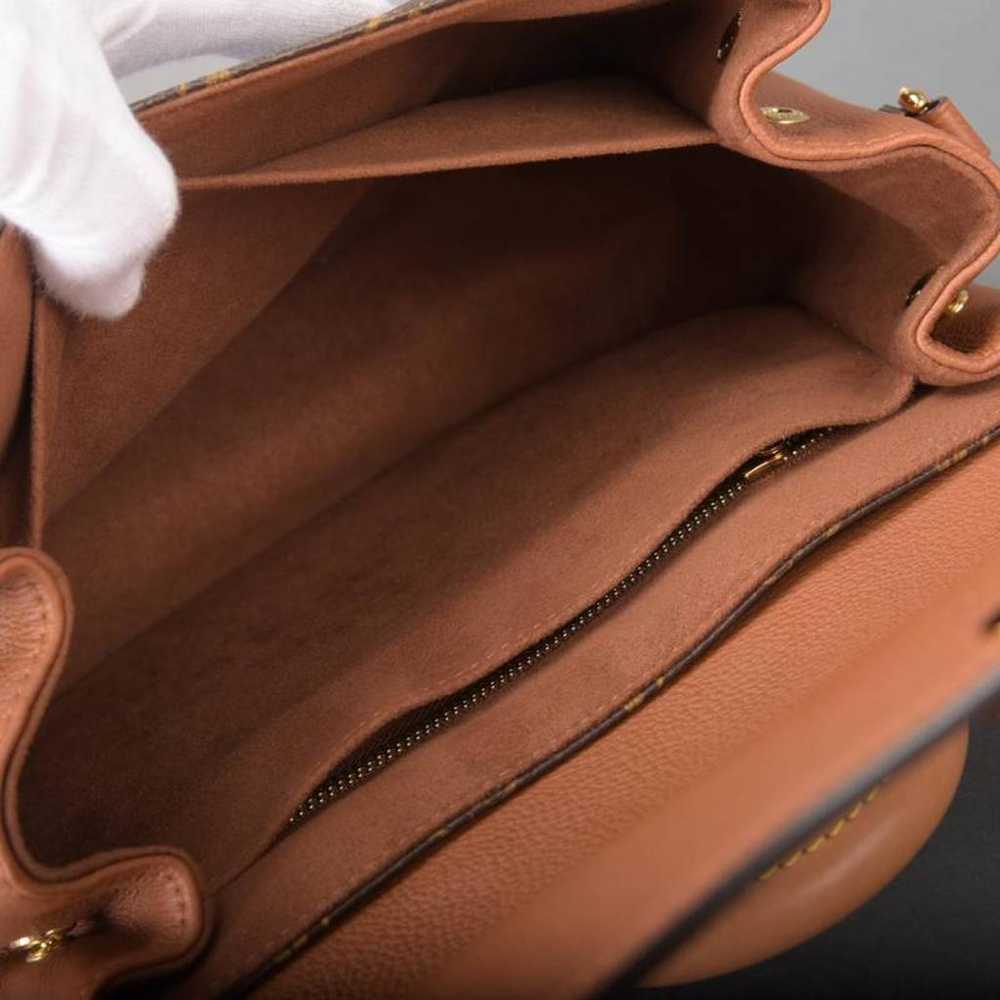 Louis Vuitton Eden leather handbag - image 9