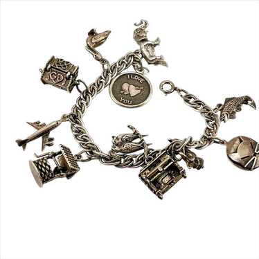Vintage Sterling Silver Charm Bracelet with 11 Charms .90 Troy Ounces