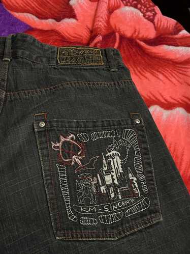 Koman × Vintage Koman embroidered jeans
