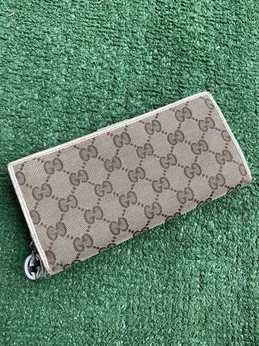 Gucci GG canvas zippy wallet