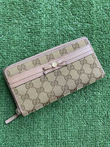 Gucci GG monogram zippy wallet