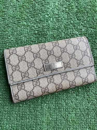 Gucci GG monogram leather trifold wallet