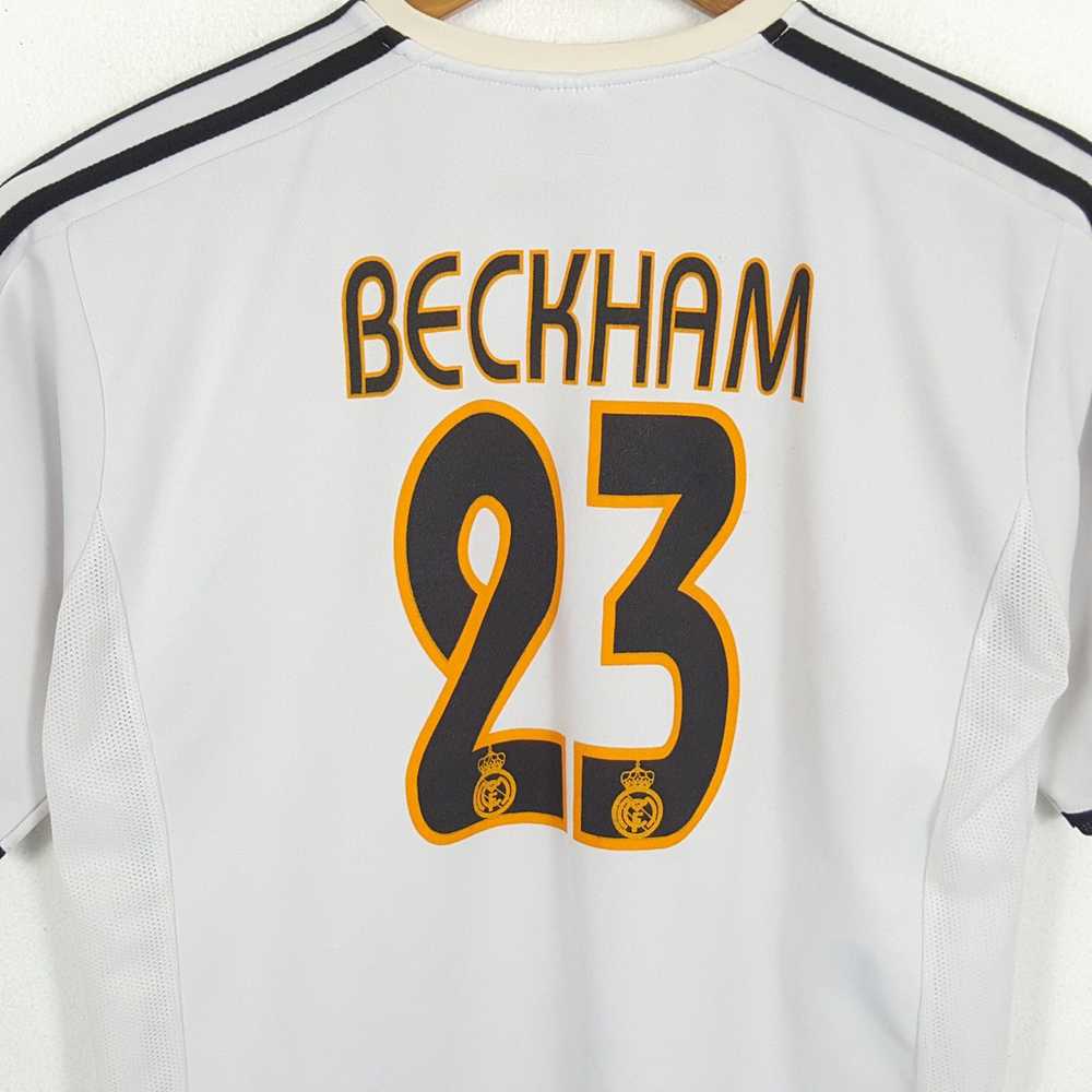 Football player David Beckham wears his Real Madrid, #23 shirt on