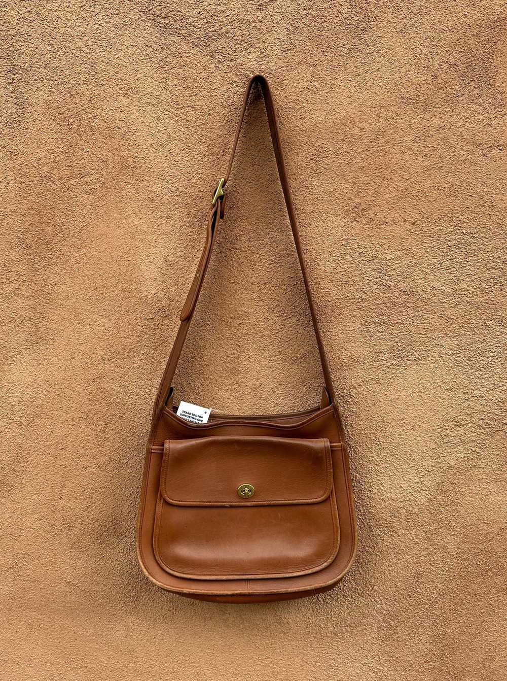 Brown Leather Coach Crossbody Saddle Bag - image 1