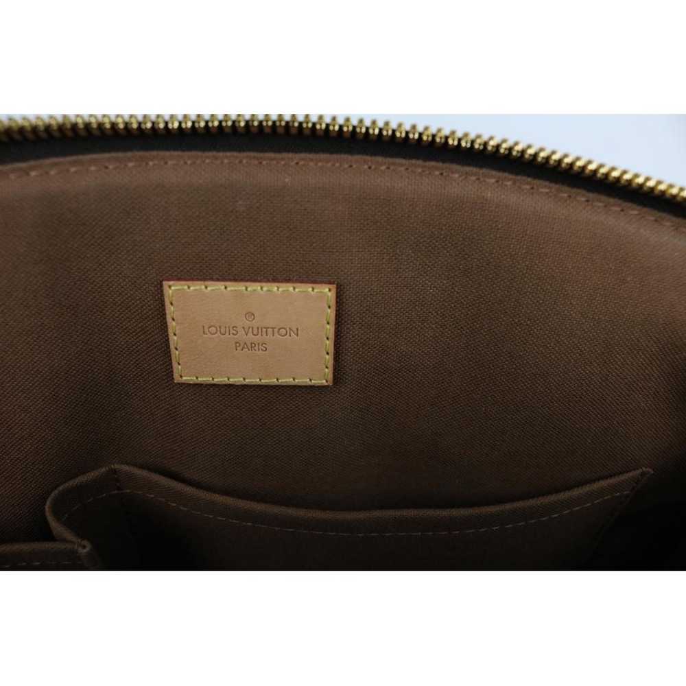 Louis Vuitton Tivoli leather handbag - image 10