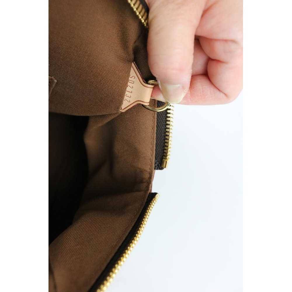 Louis Vuitton Tivoli leather handbag - image 9