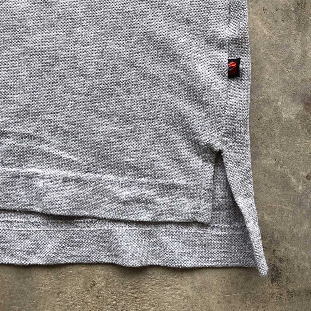 swoosh shirt polo