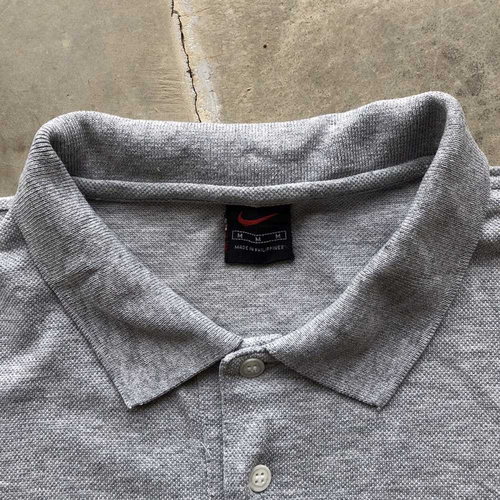 swoosh shirt polo