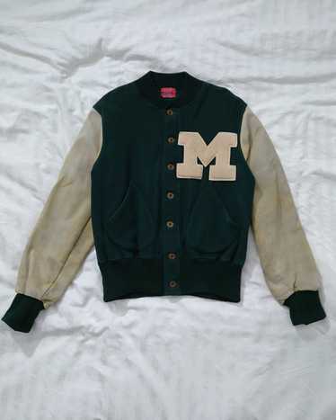 The classic 1950'S men's Varsity jacket with a corrupting latex twist.
