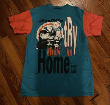 Vintage Miami Dolphins Blitz Angry Player T-Shirt - Skullridding