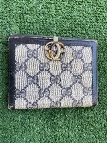 Gucci GG monogram leather bifold wallet