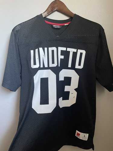 Undefeated UNDFTD Bad Sports Sport is War Varsity Football Rugby Soccer  Jersey L