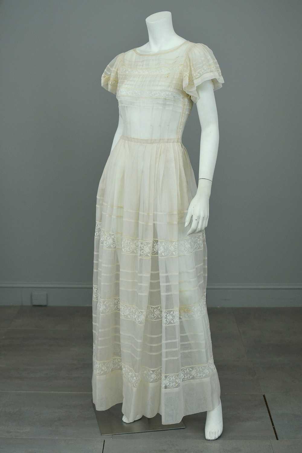 1970s Lovely Sheer Cream Tiered Panel Gown with Flutt… - Gem