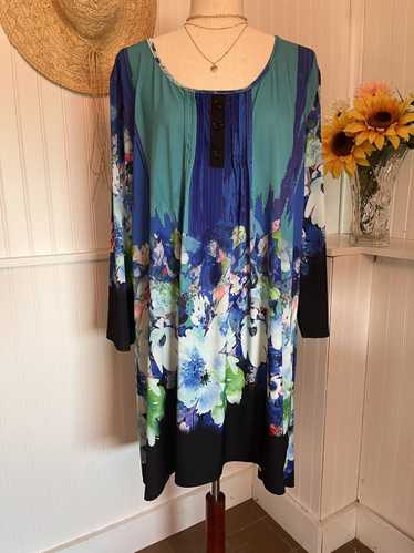 Other Scooped neckline adorns this gorgeous Tunic